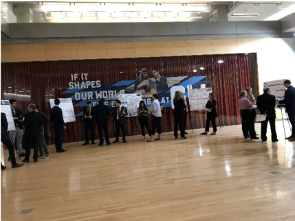 group of people standing in the Science and Engineering Hall
