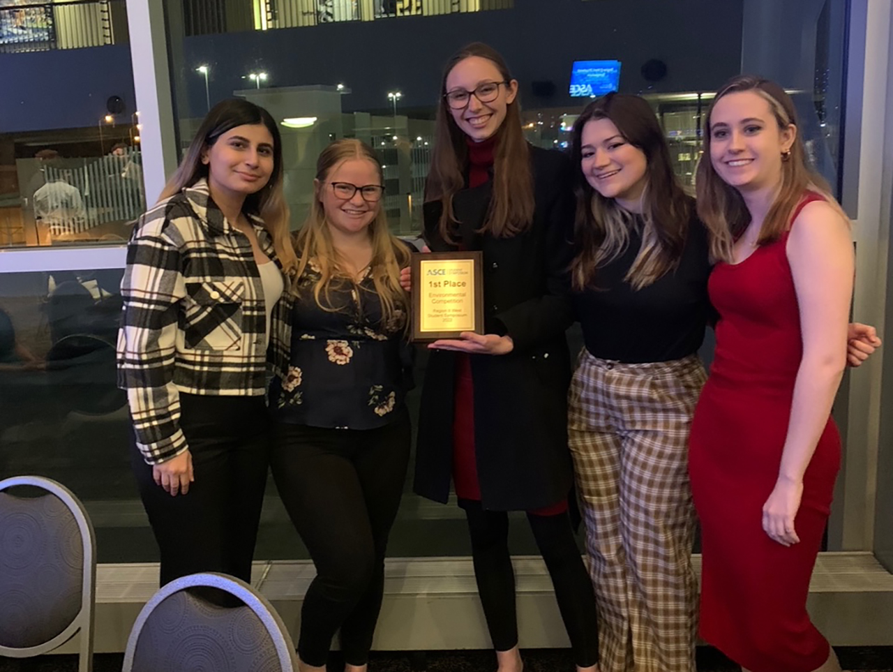 students posing with 1st place award