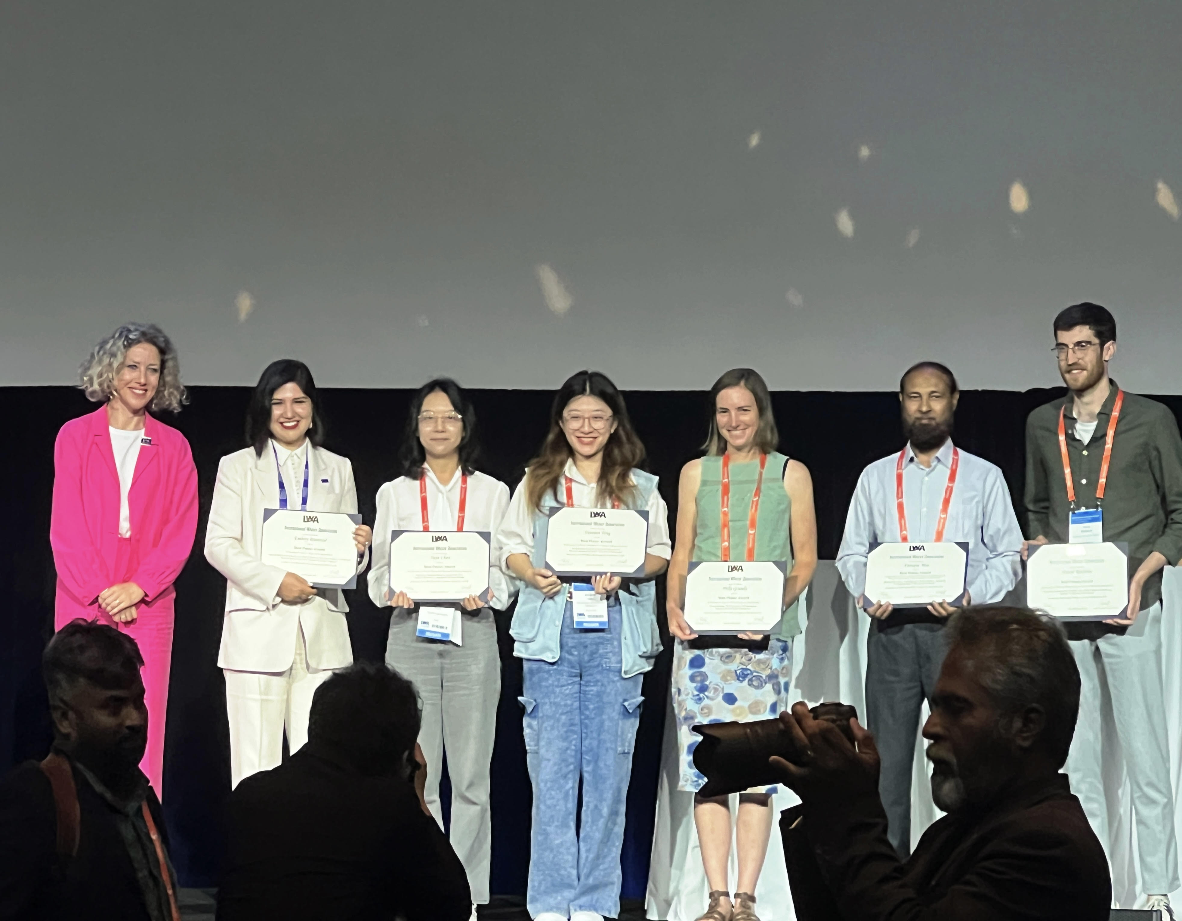  Xiaonan Tang with her award at the World Water Congress