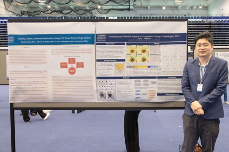 Diyi Liu with his poster, “Evaluating the Potential Impacts of Congestion Pricing in Washington, D.C.”