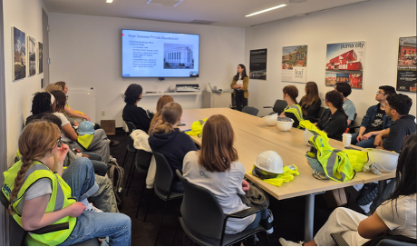 Company reps giving a presentation to students