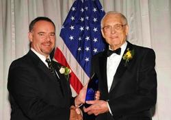 ed becraft accepting an award