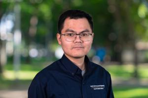 Man in a navy polo shirt