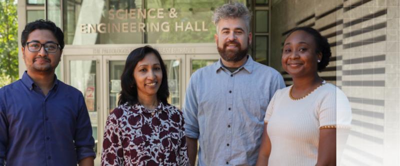 Professor Riffat standing with 3 students outside of the science and engineering hall